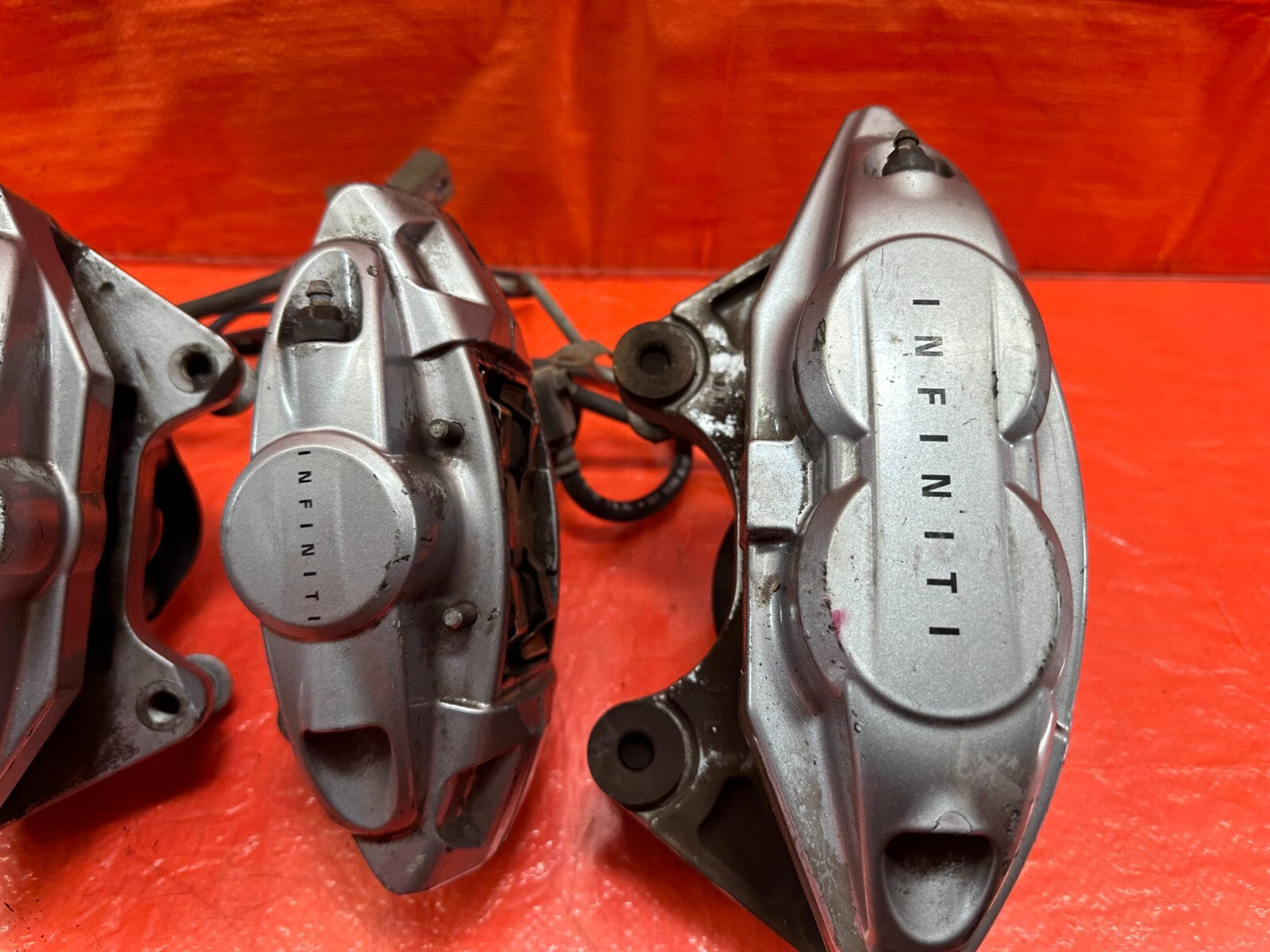 08 15 INFINITI G37 & Q60 SPORT   AKEBONO   BRAKE CALIPERS LEFT & RIGHT   OEM 1906