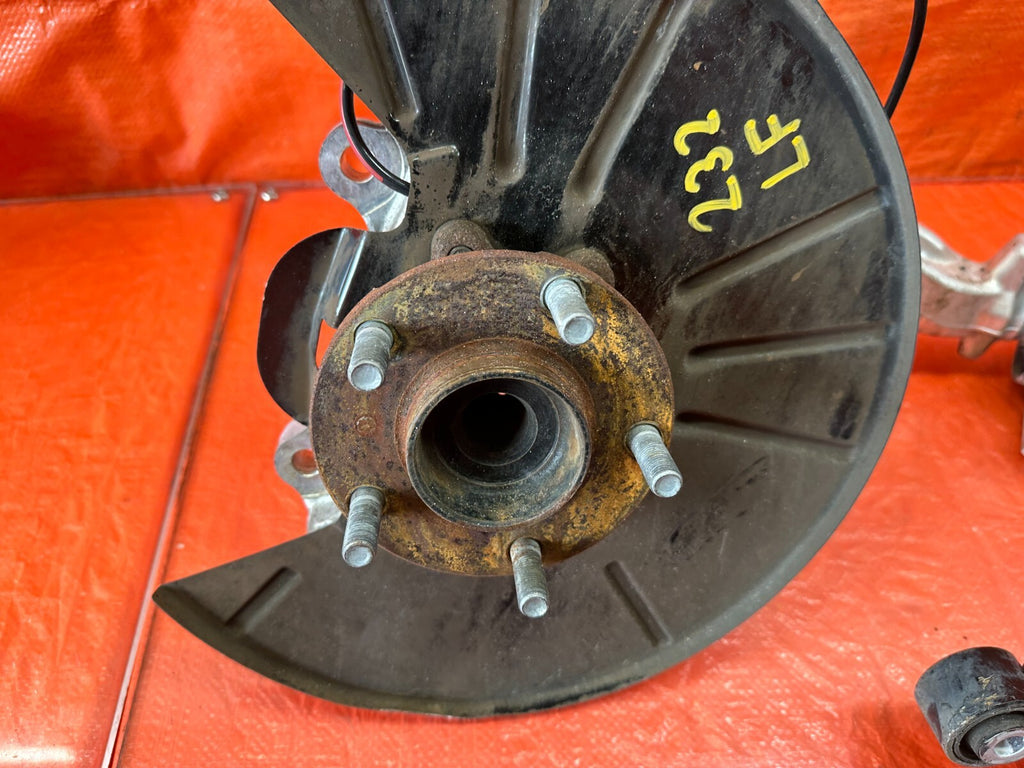 08 15 INFINITI G37 COUPE S   LEFT FRONT SPINDLE W/ CONTROL ARMS & SHOCK OEM #23213