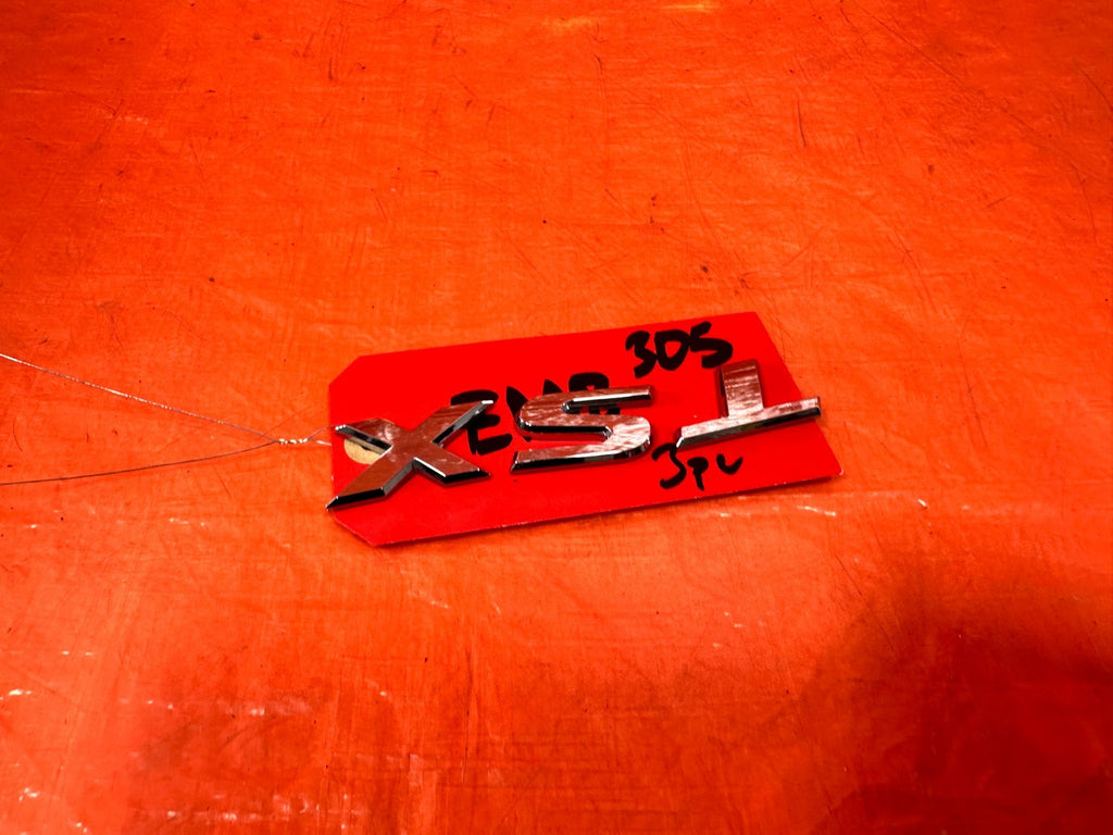 09 14 ACURA TSX   TSX MOUNTED TRUNK BADGE EMBLEM LOGO INSIGNIA   OEM 3054