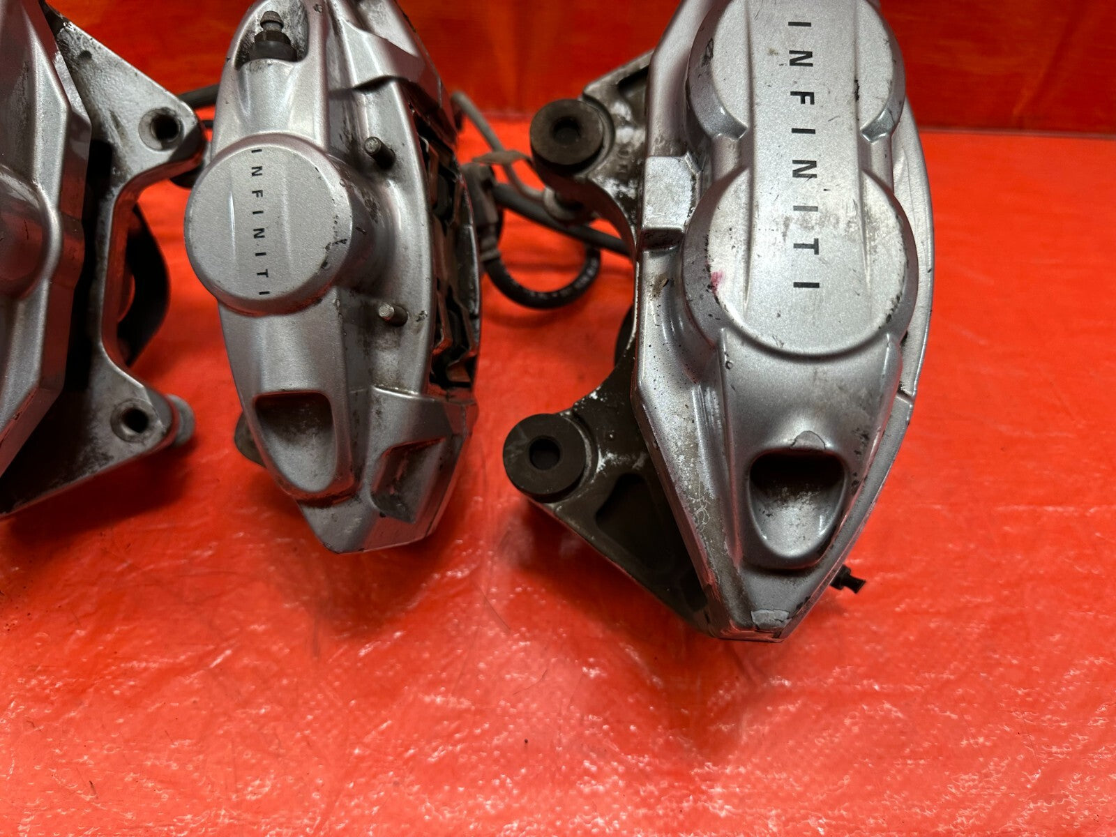 08 15 INFINITI G37 & Q60 SPORT   AKEBONO   BRAKE CALIPERS LEFT & RIGHT   OEM 1905