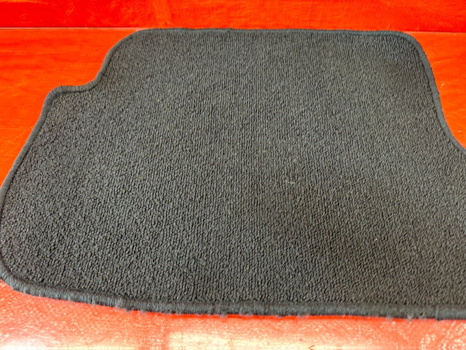 MAZDA FLOOR MAT   LEFT REAR SIDE   PART # BLMS 8M L03A   OEM #1857