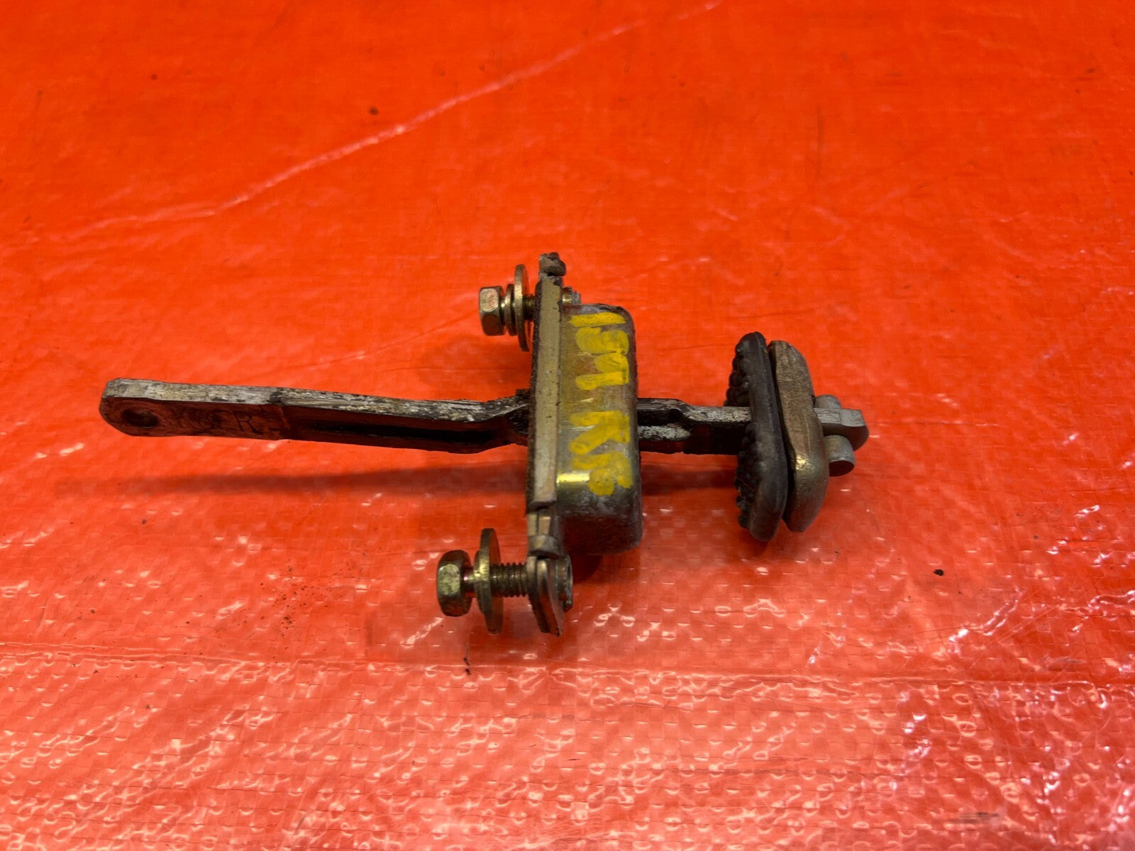 90 96 ACURA INTEGRA SEDAN   LEFT OR RIGHT FRONT DOOR CHECKER HINGE ARM STOPPER5