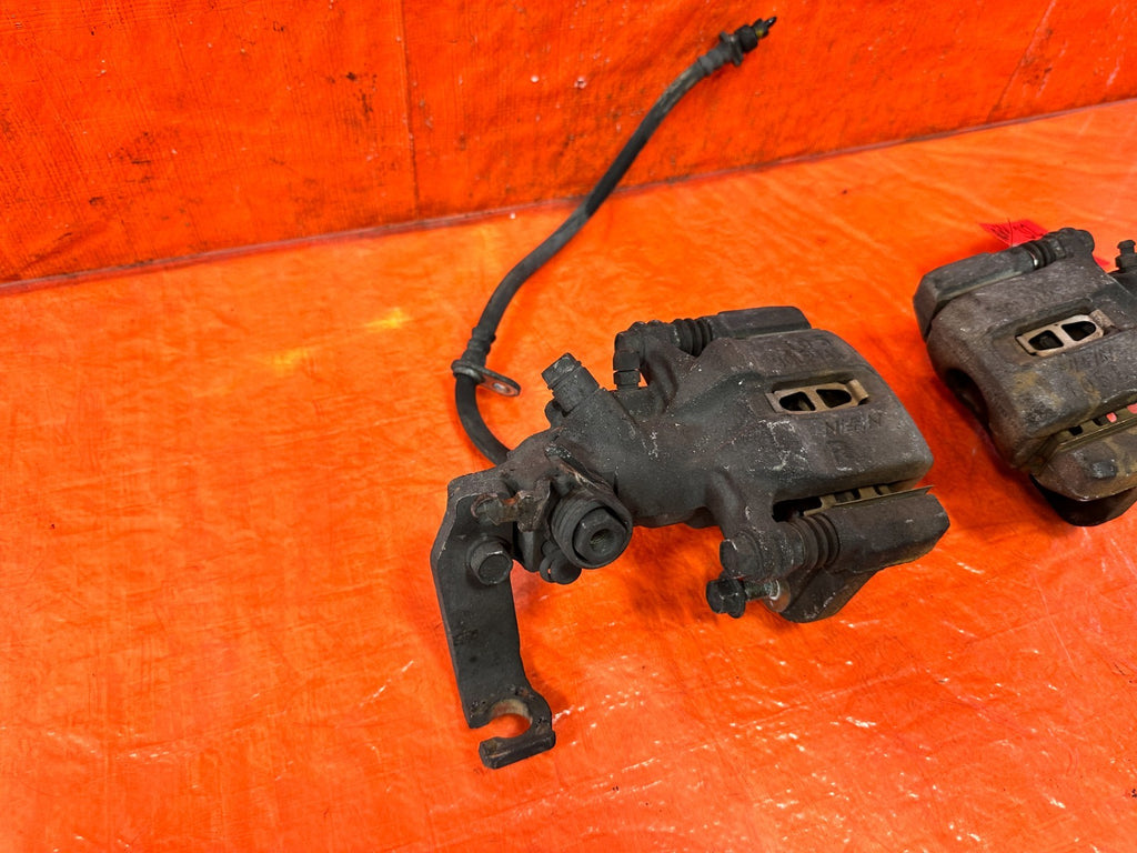 04 08 ACURA TSX   LEFT AND RIGHT REAR BRAKE CALIPERS   OEM FACTORY #3124