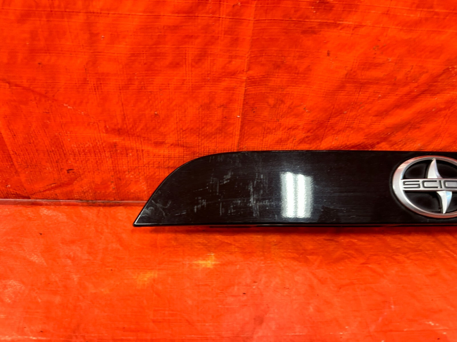 13 16 SCION FRS   REAR CENTER   TRUNK INSERT WITH SCION BADGE INSIGNIA OEM 2933