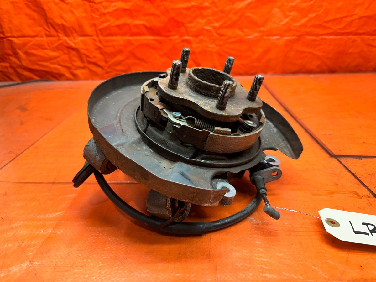 90-96 NISSAN 300ZX Z32 3.0L DRIVER LEFT REAR SUSPENSION KNUCKLE SPINDLE HUB OEM1
