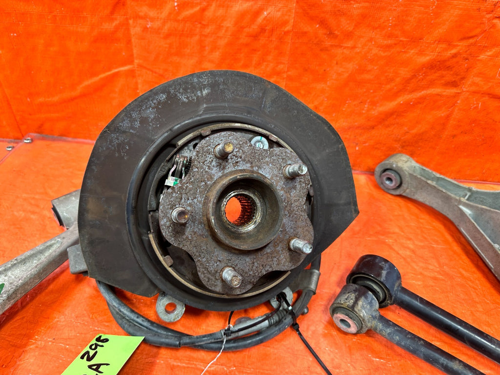 03 07 INFINITI G35 COUPE RIGHT REAR SPINDLE KNUCKLE HUB W/ ALL CONTROL ARMS 2989