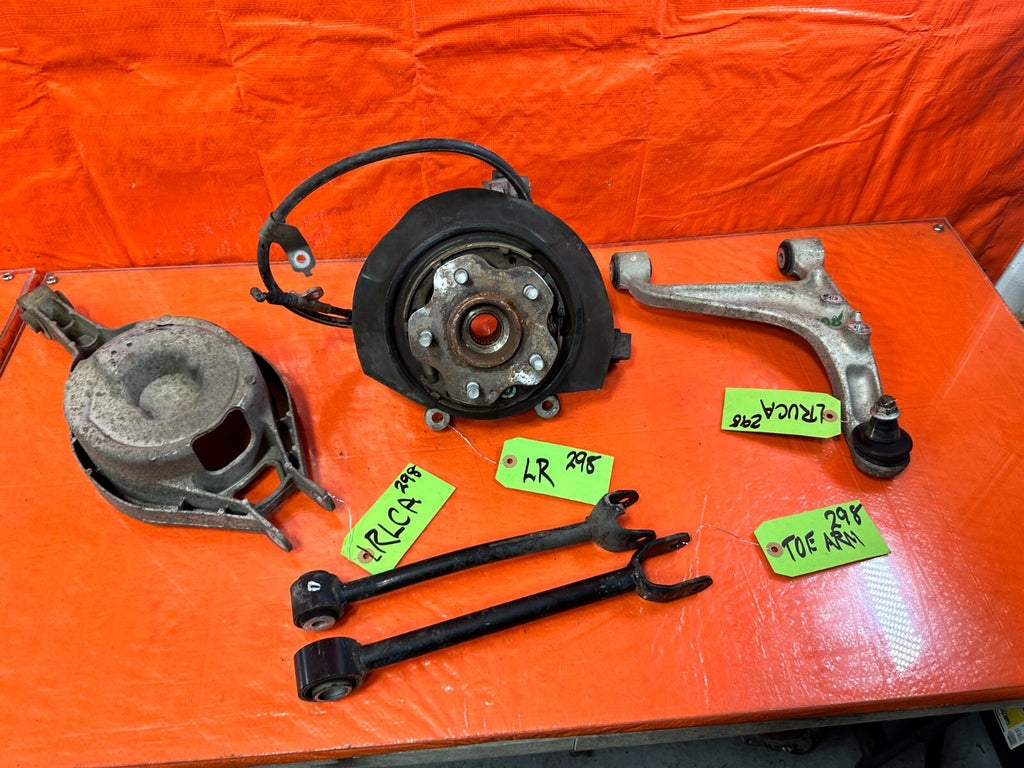 03 07 INFINITI G35 COUPE   LEFT REAR SPINDLE KNUCKLE HUB W/ ALL CONTROL ARMS 29810