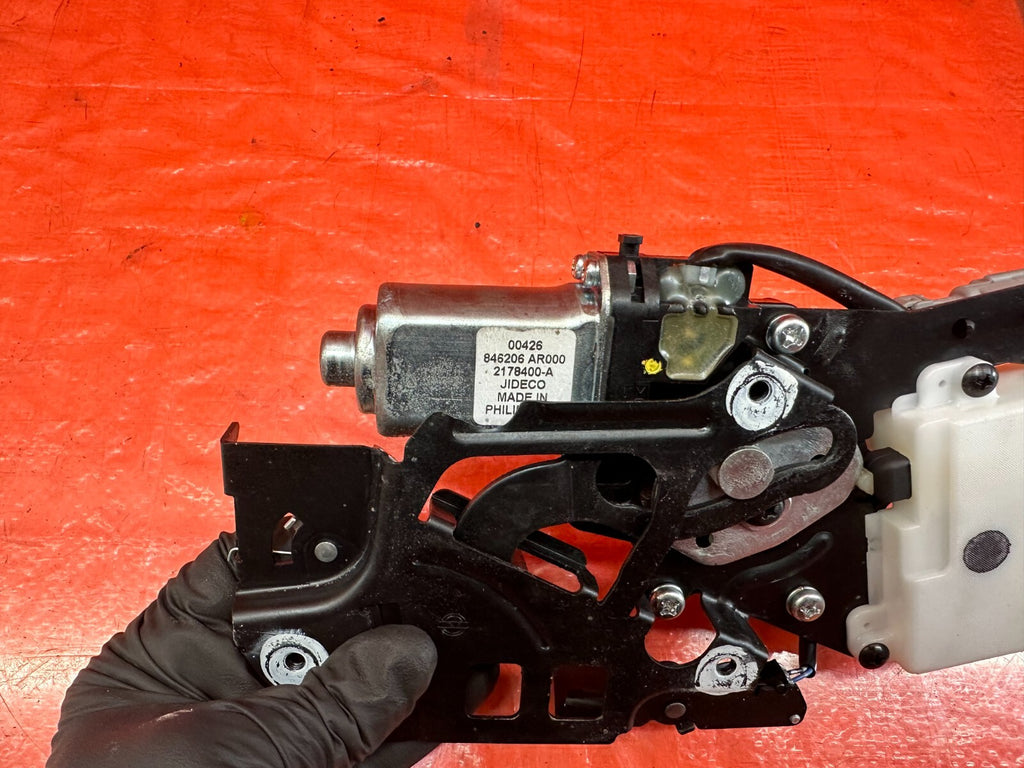 09 13 INFINITI G37 CONVERTIBLE   CNVERTIBLE TOP TRUNK LATCH MOTOR   OEM #2326