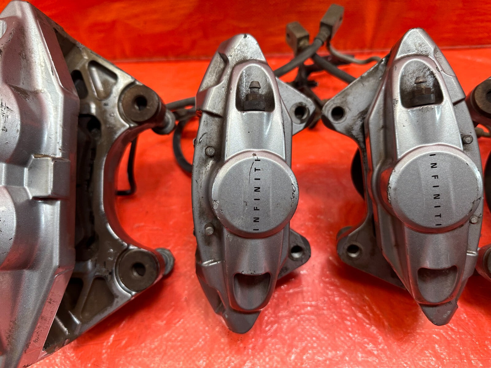 08 15 INFINITI G37 & Q60 SPORT   AKEBONO   BRAKE CALIPERS LEFT & RIGHT   OEM 1908