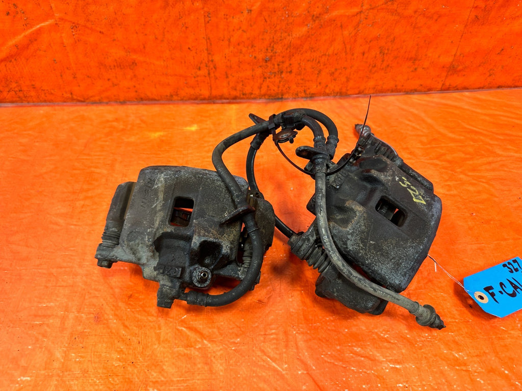 92 95 HONDA CIVIC EX SI   LEFT AND RIGHT FRONT BRAKE CALIPERS AND LINES OEM 32710