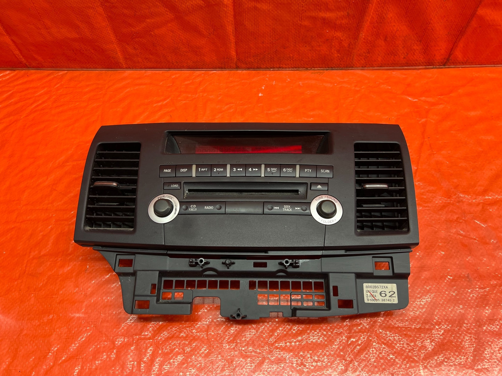 12 13 LANCER EVOLUTION X EVO 10   5 SPEED   RADIO STEREO FACE PLATE   OEM #1776