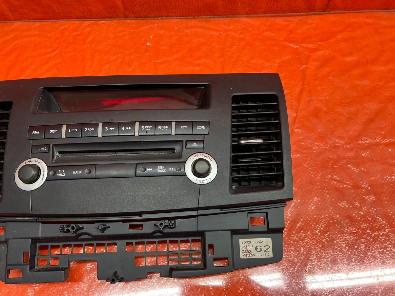 12 13 LANCER EVOLUTION X EVO 10   5 SPEED   RADIO STEREO FACE PLATE   OEM #1778