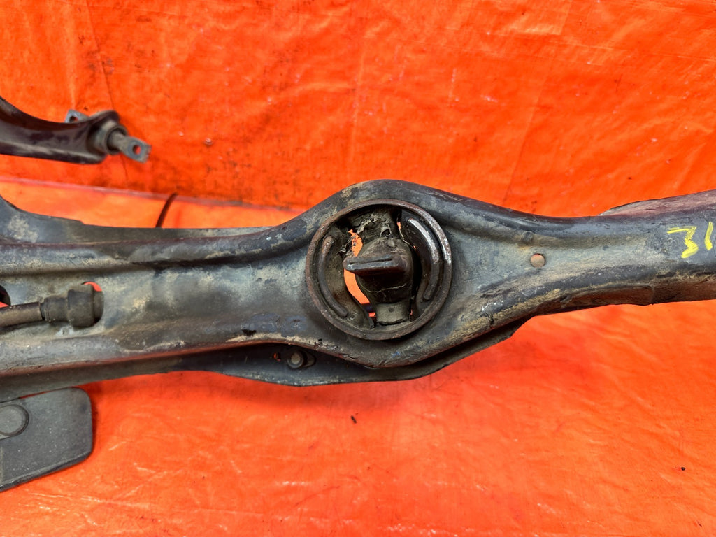 90 91 HONDA CIVIC HATCHBACK   PASSENGER RIGHT REAR TRAILING ARM LOWER ARM   OEM2