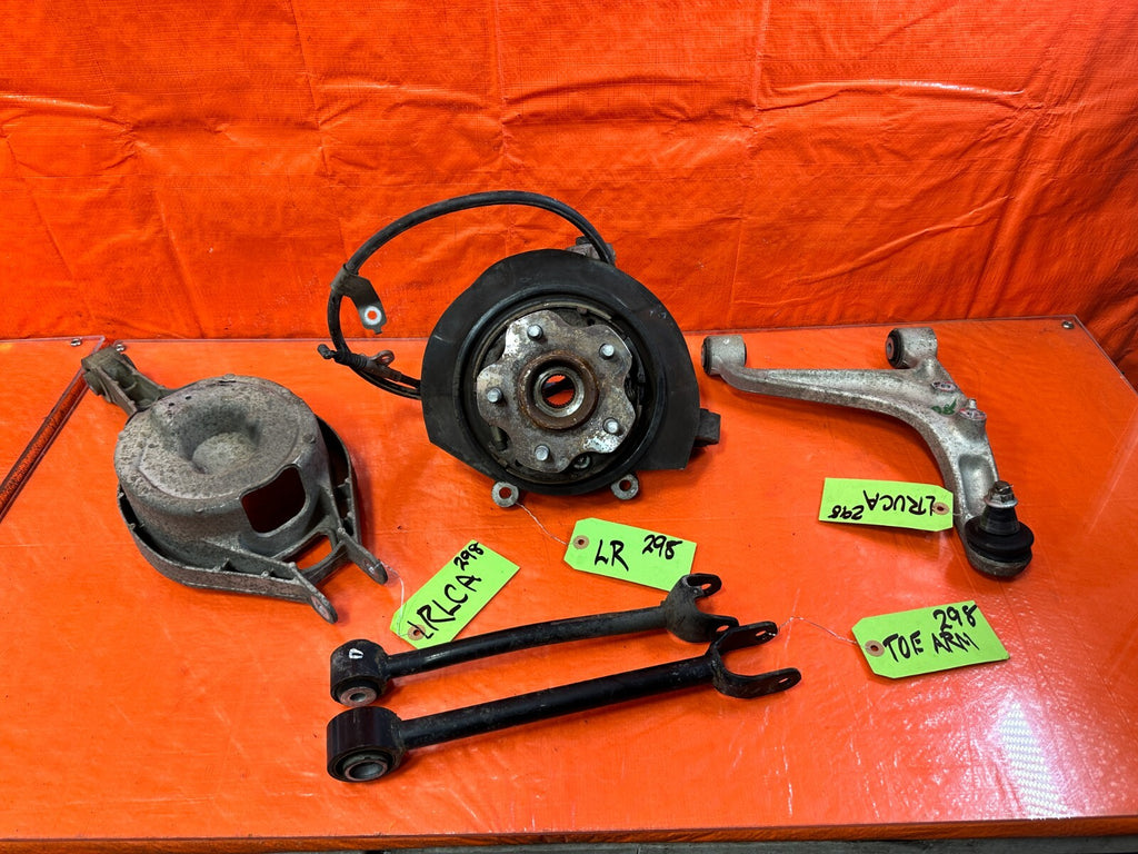 03 07 INFINITI G35 COUPE   LEFT REAR SPINDLE KNUCKLE HUB W/ ALL CONTROL ARMS 2980