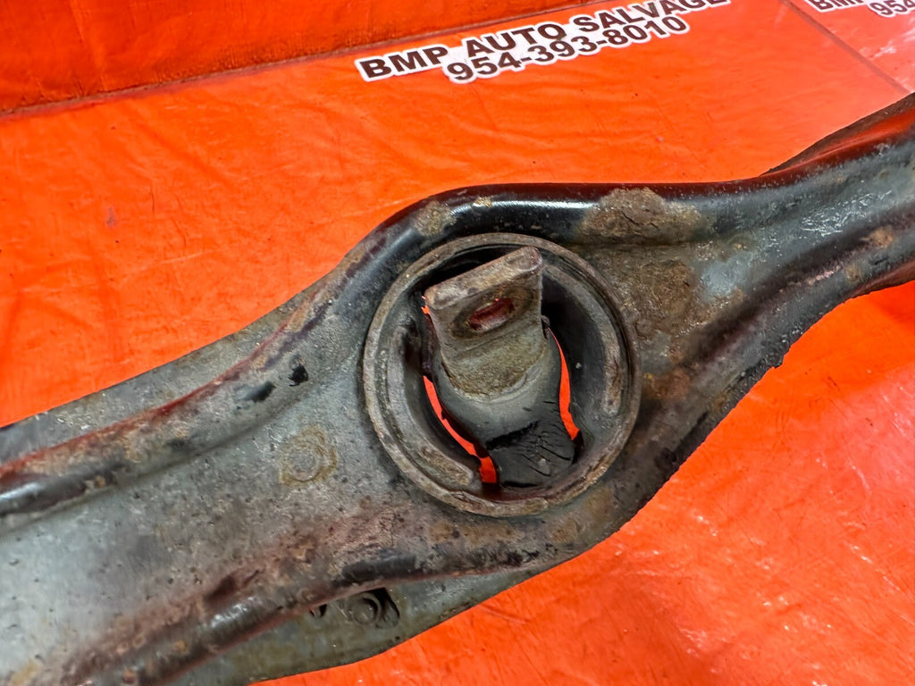 94 01 ACURA INTEGRA   PASSENGER RIGHT REAR TRAILING ARM WITH CALIPER ROTOR CABLE13