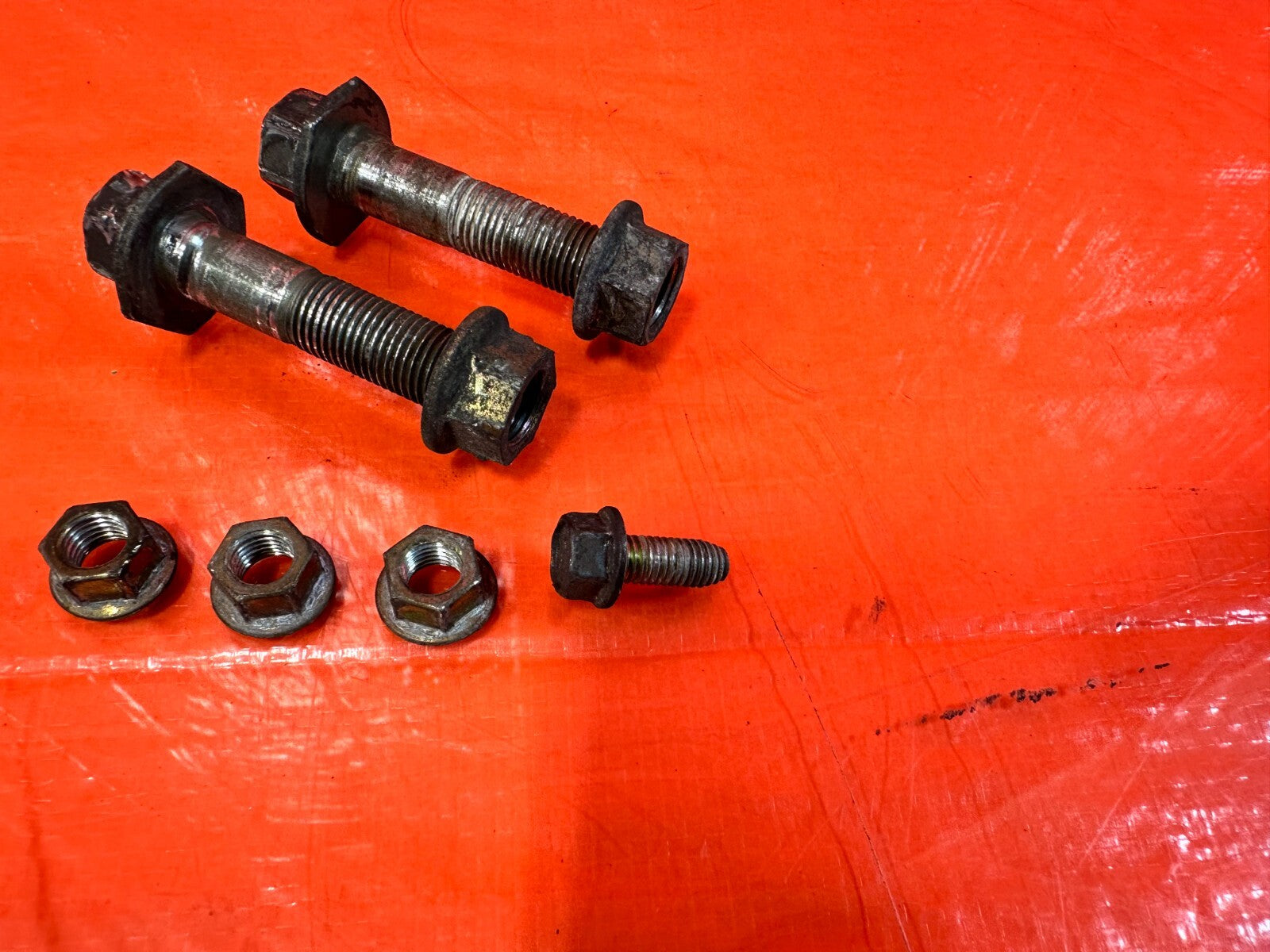 03 06 LANCER EVOLUTION VIII 8 EVO IX 9   FRONT SHOCK BOLTS   OEM #EVO94