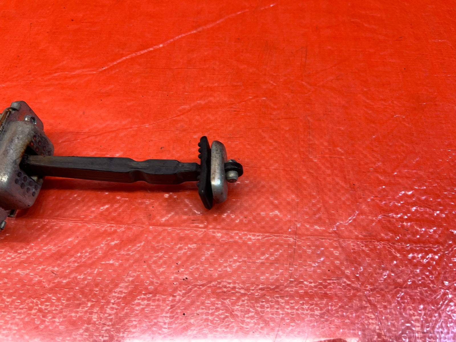 98 02 HONDA ACCORD SEDAN   PASSENGER REAR DOOR CHECKER HINGE ARM STOPPER OEM 16710