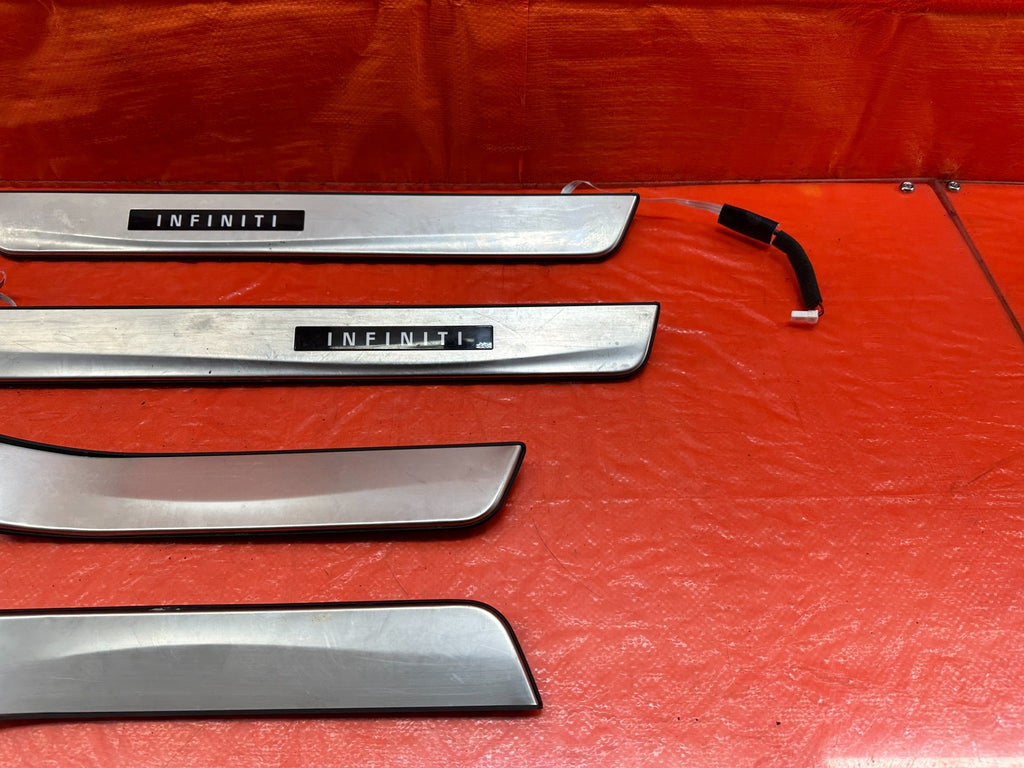 16 20 INFINITI Q50   ILLUMINATING FLOOR PILLAR SCUFF PLATE SET   OEM FACTORY 2156