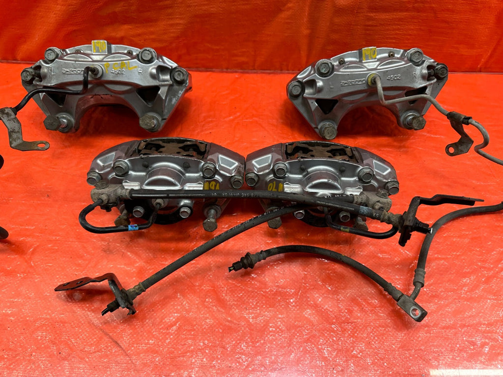 08 15 INFINITI G37 & Q60 SPORT   AKEBONO   BRAKE CALIPERS LEFT & RIGHT   OEM 19020