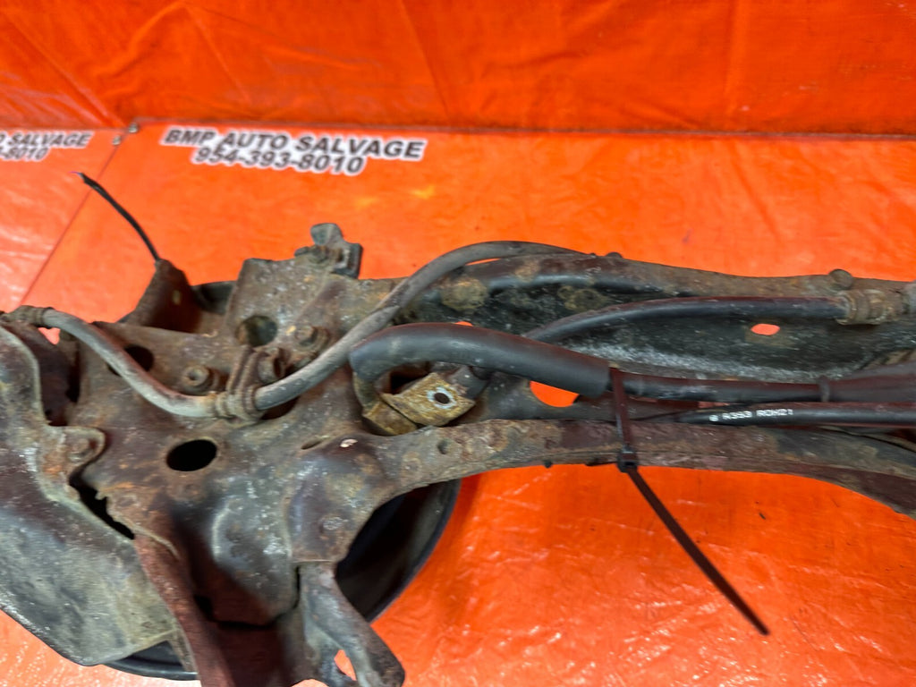 94 01 ACURA INTEGRA   PASSENGER RIGHT REAR TRAILING ARM WITH CALIPER ROTOR CABLE19