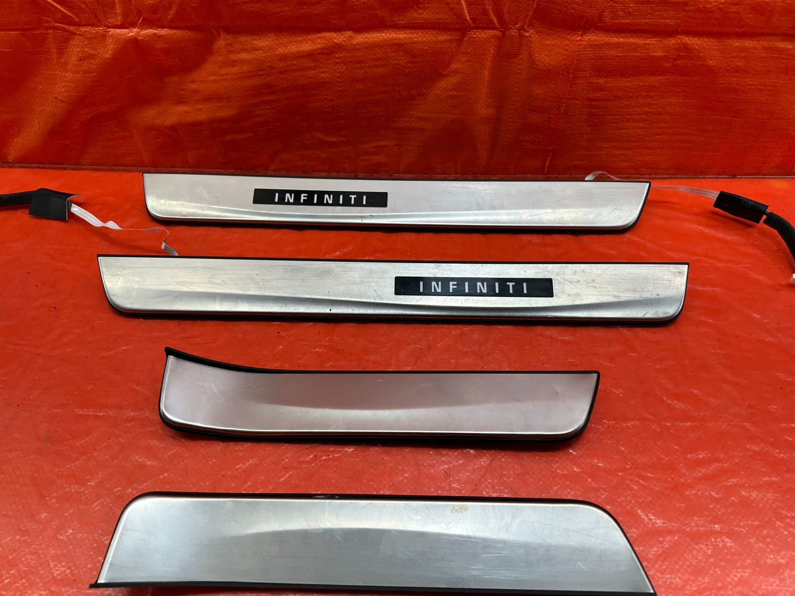 16 20 INFINITI Q50   ILLUMINATING FLOOR PILLAR SCUFF PLATE SET   OEM FACTORY 2155