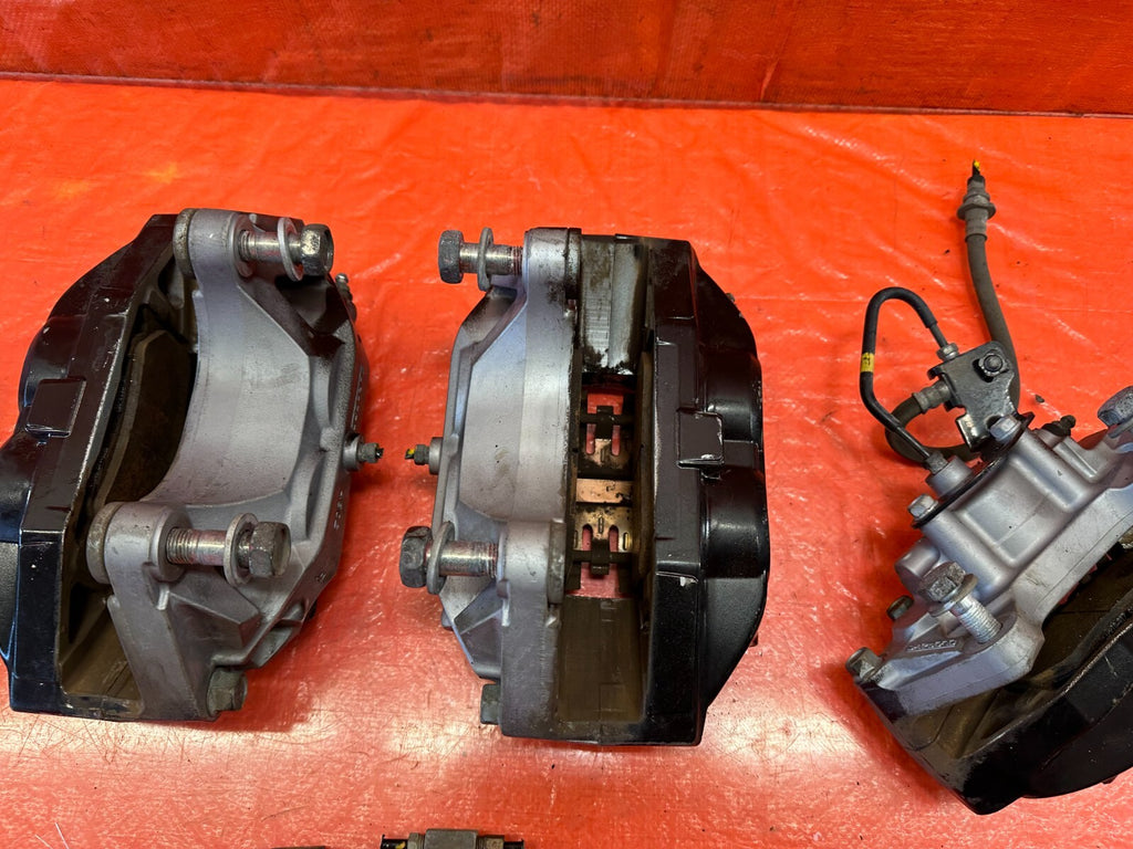 08 15 INFINITI G37 & Q60 SPORT   AKEBONO   BRAKE CALIPERS LEFT & RIGHT   OEM 23216