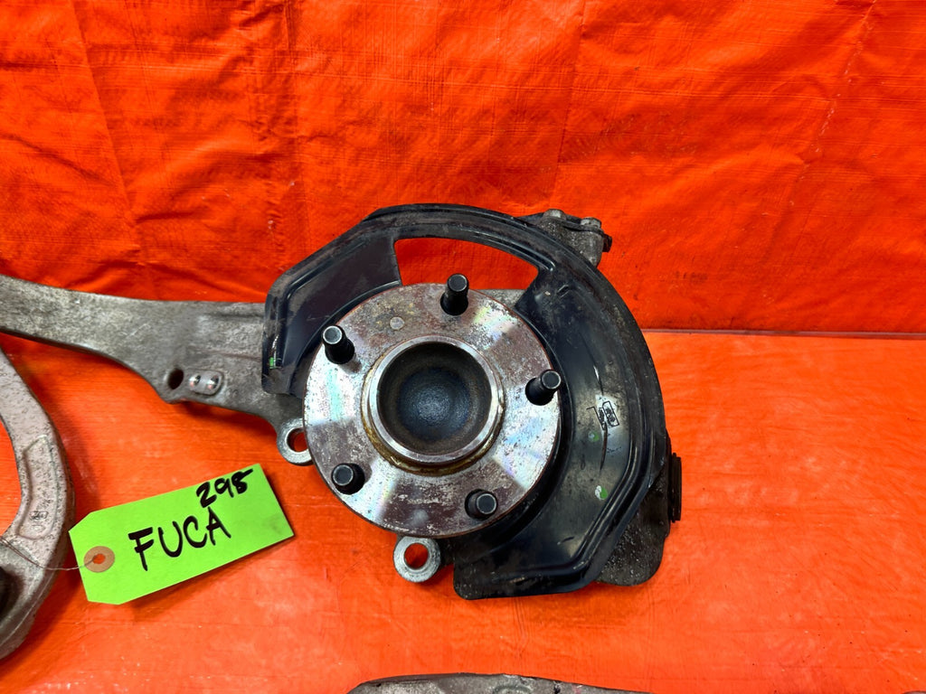 03 07 INFINITI G35 COUPE LEFT FRONT SPINDLE KNUCKLE HUB W/ ALL CONTROL ARMS 2981