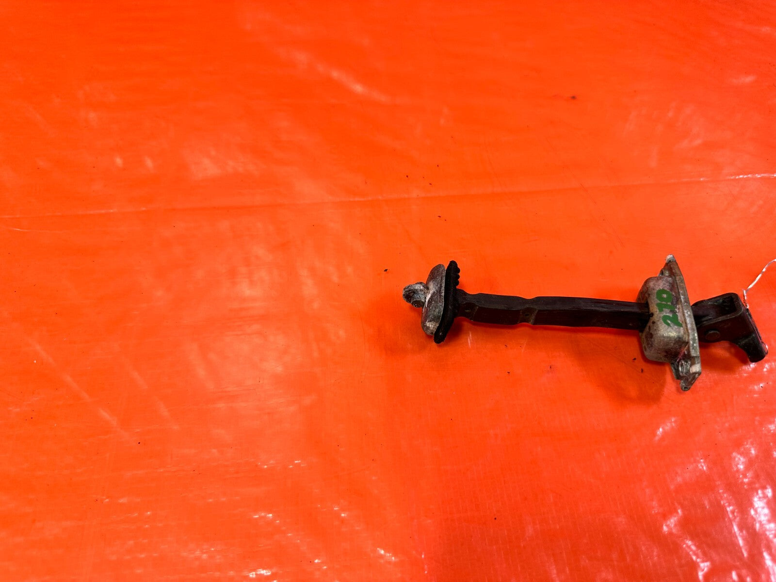 06 11 CIVIC 4D SEDAN   PASSENGER RIGHT REAR DOOR CHECKER HINGE ARM STOPPER #27010