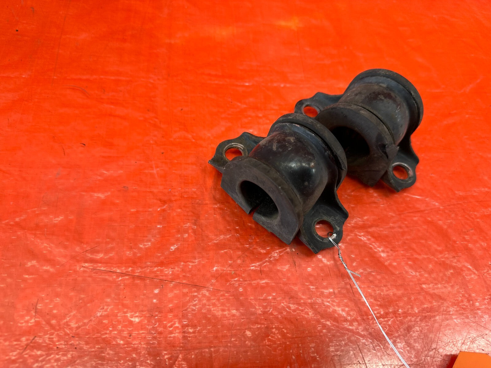 04 07 HONDA S2000   FRONT SWAY STABILIZER BAR BUSHINGS AND BRACKETS   OEM #2243
