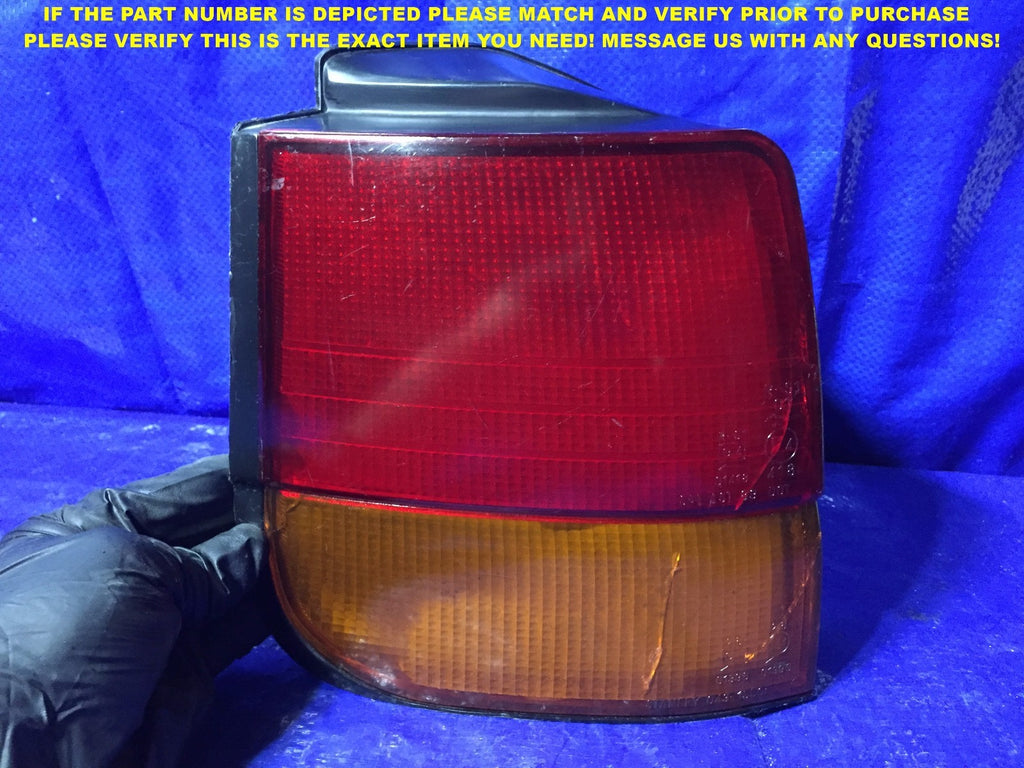 OEM 1992 1993 1994 1995 MITSUBISHI EXPO DRIVER LEFT TAIL LIGHT L IMPERFECTIONS0