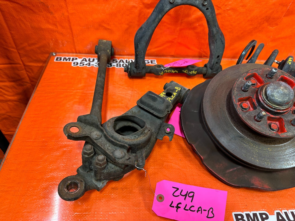 96 00 TOYOTA TACOMA   2.4L   MANUAL ONLY   LEFT FRONT SPINDLE W/ CONTROL ARMS9