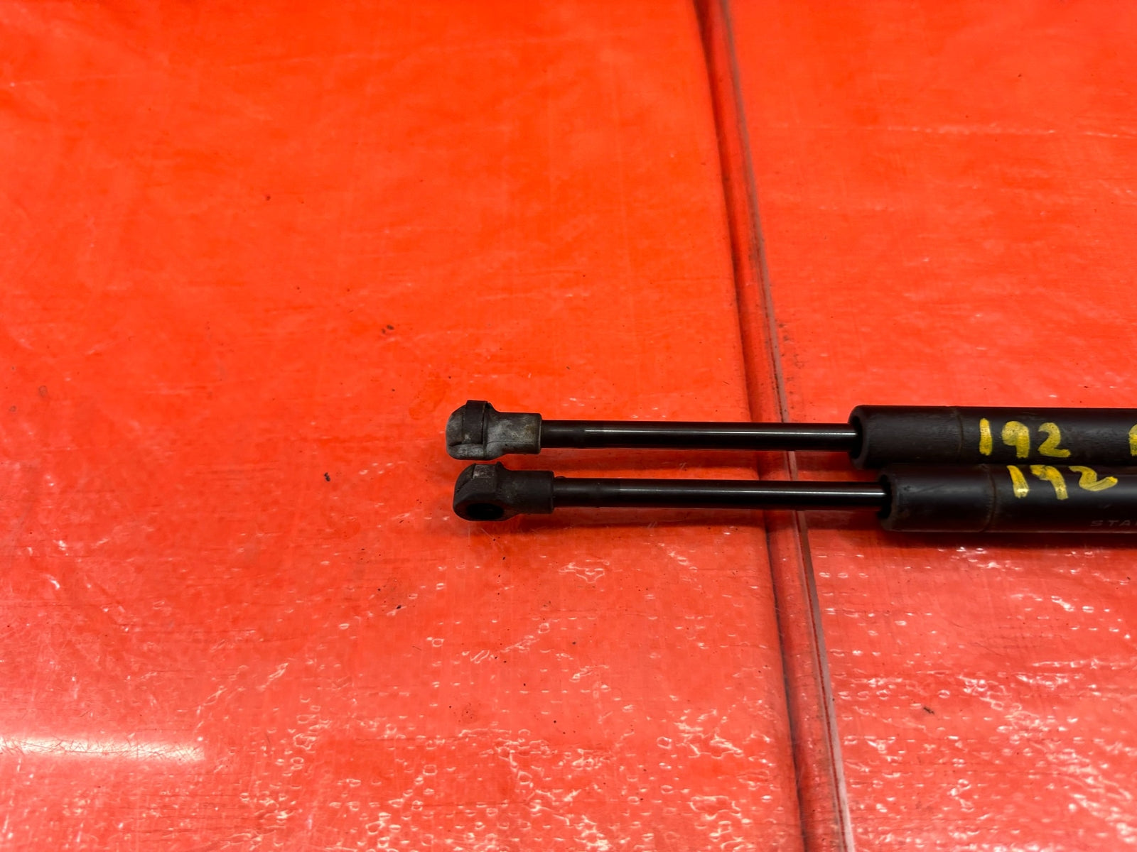 07 10 INFINITI G35 G37 SEDAN   LEFT AND RIGHT REAR TRUNK SHOCKS   OEM #1926