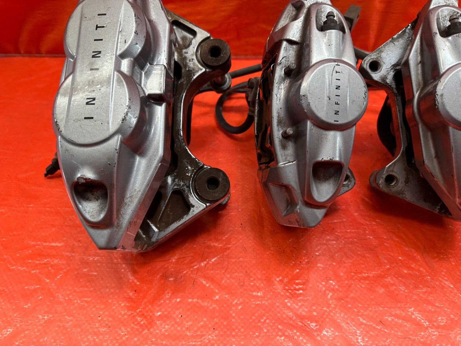 08 15 INFINITI G37 & Q60 SPORT   AKEBONO   BRAKE CALIPERS LEFT & RIGHT   OEM 19011