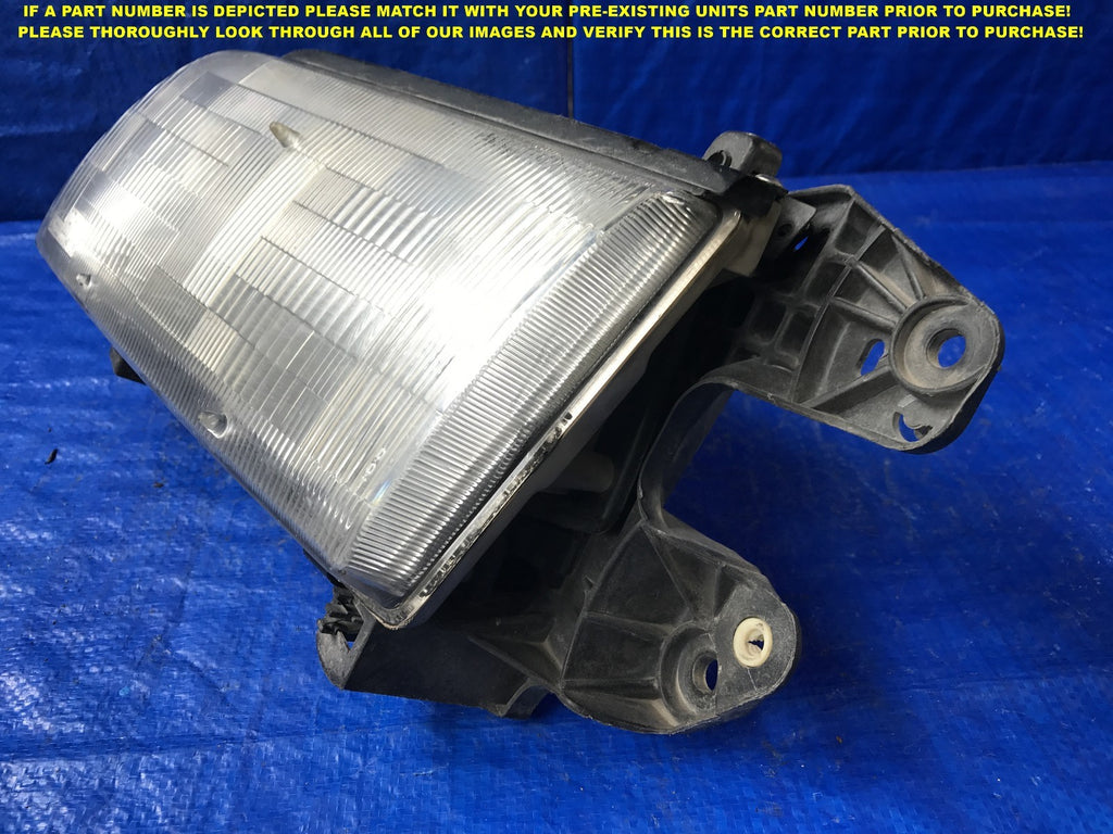 OEM 1989 1990 1991 1992 1992 1994 MAZDA MP5 DRIVER LEFT HEADLIGHT BRKN TAB HL24