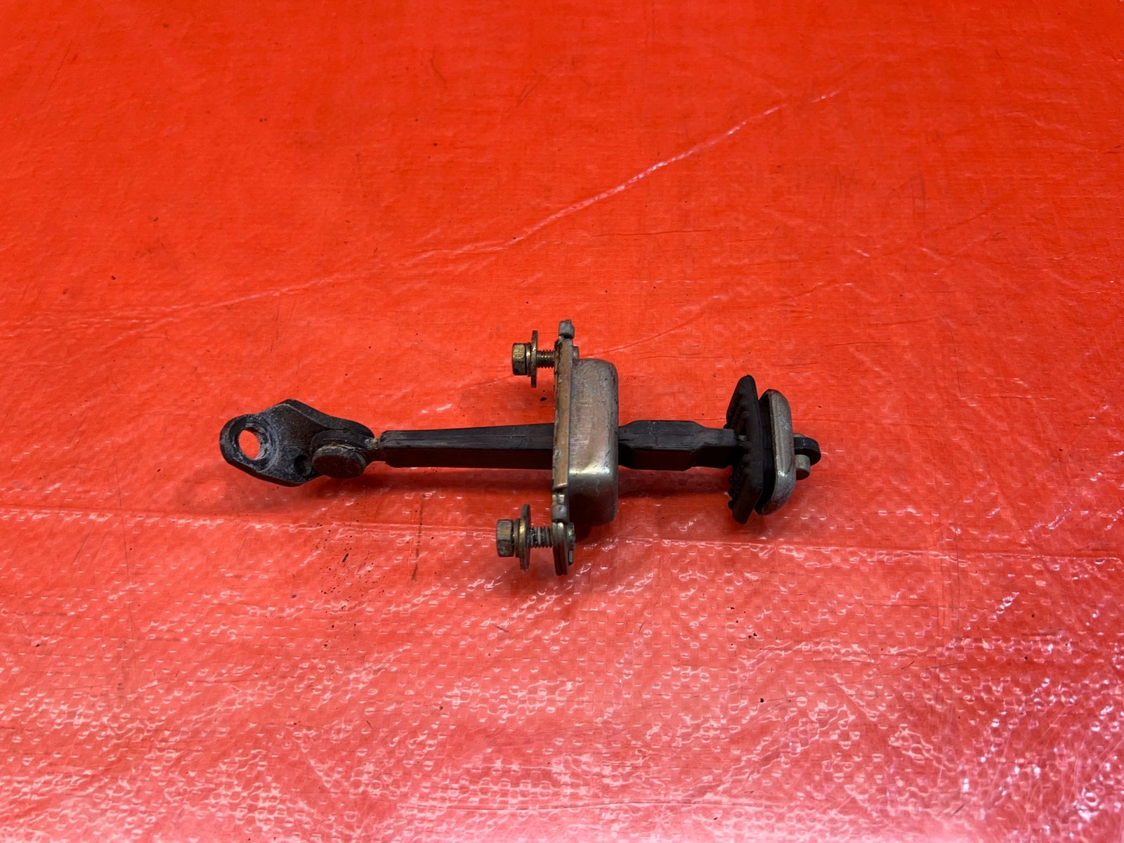 98 02 HONDA ACCORD SEDAN   DRIVER LEFT REAR DOOR CHECKER HINGE ARM STOPPER OEM9