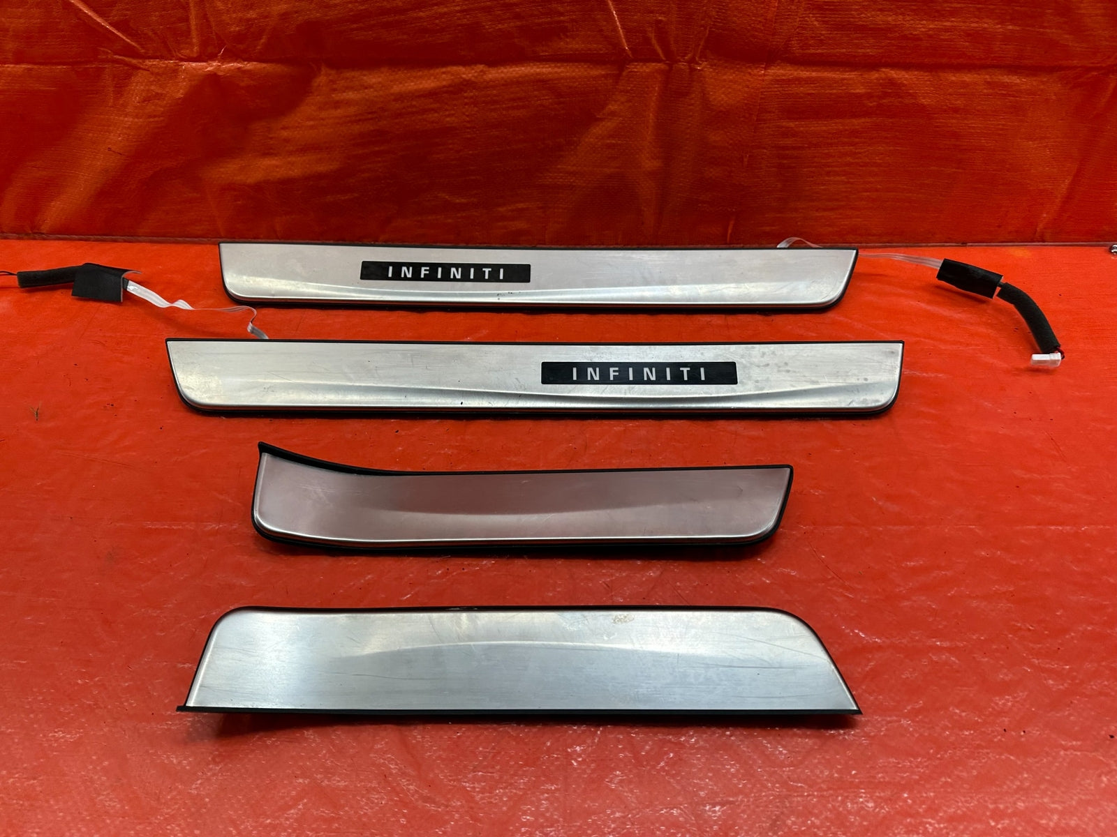 16 20 INFINITI Q50   ILLUMINATING FLOOR PILLAR SCUFF PLATE SET   OEM FACTORY 2154