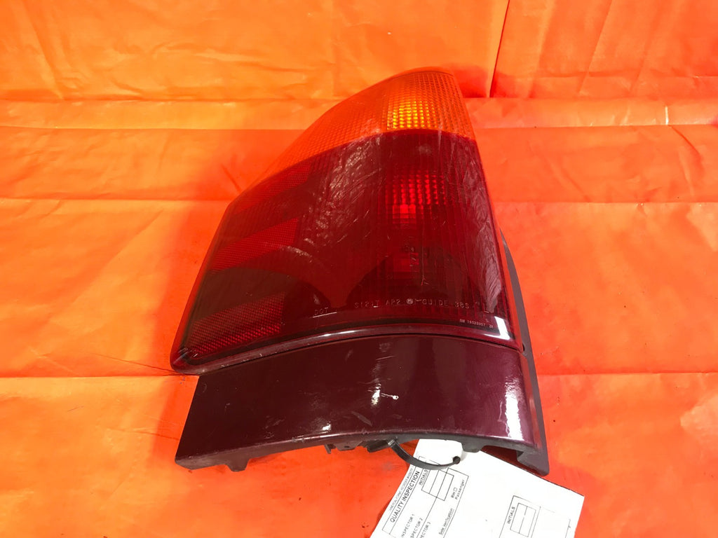 OEM 2006 06 GENERAL MOTORS GMC ENVOY DRIVER LEFT TAIL LIGHT LAMP 15070903 0