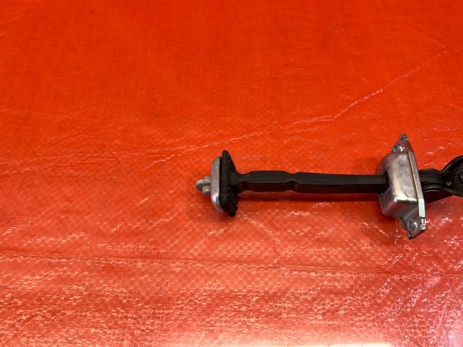 06 11 CIVIC 4D SEDAN   PASSENGER RIGHT REAR DOOR CHECKER HINGE ARM STOPPER #1557