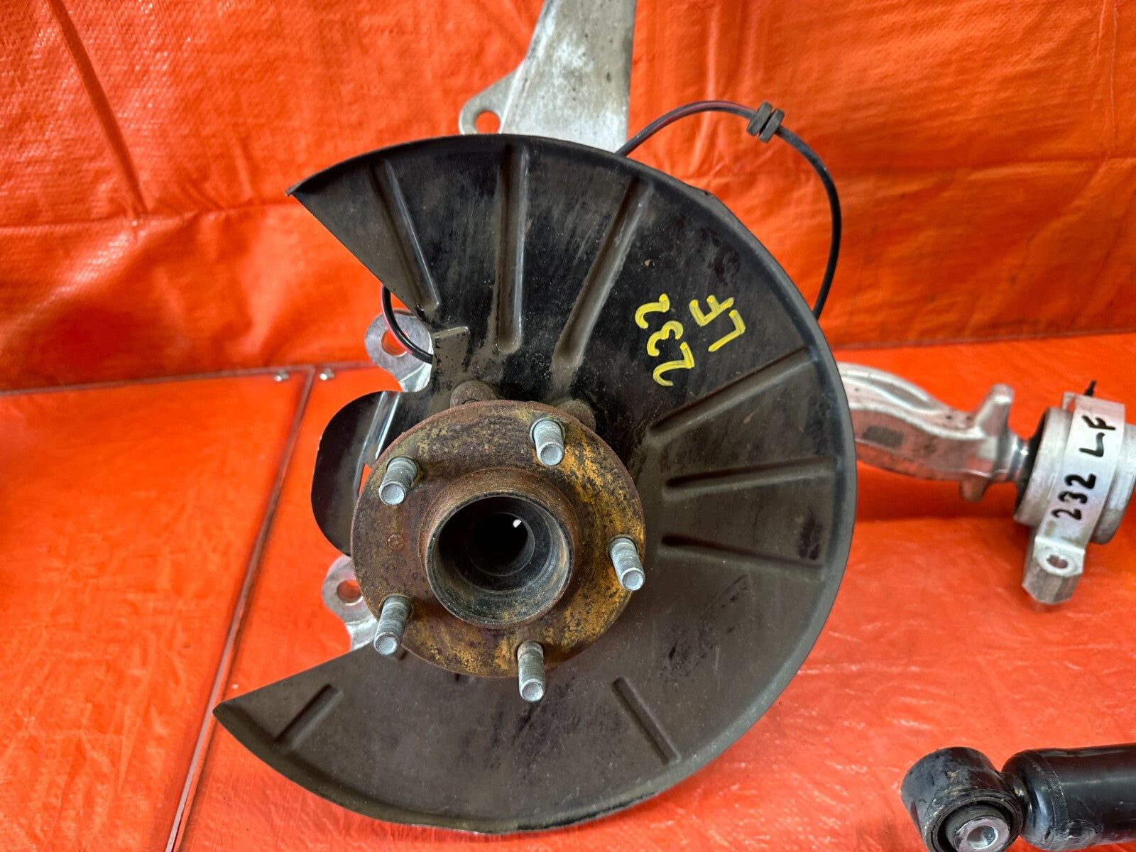 08 15 INFINITI G37 COUPE S   LEFT FRONT SPINDLE W/ CONTROL ARMS & SHOCK OEM #23214
