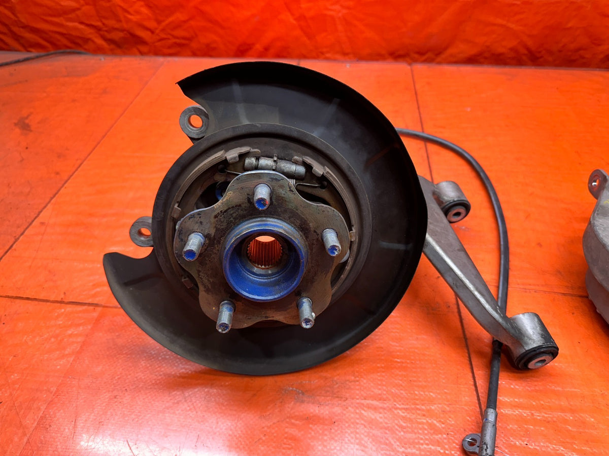 03-08 NISSAN 350Z LEFT REAR SPINDLE KNUCKLE HUB WITH CONTROL ARMS OEM #3466