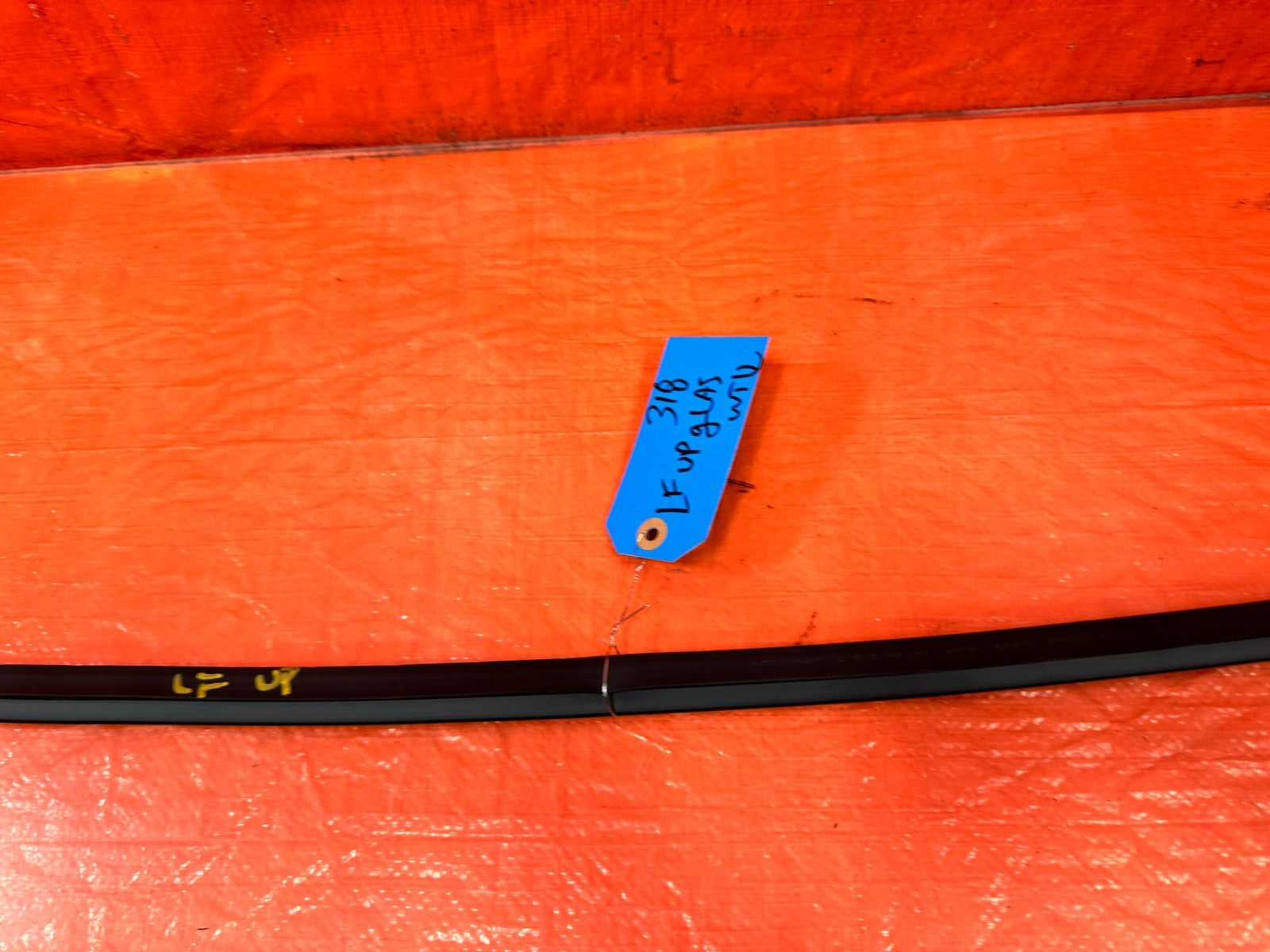10 16 HYUNDAI GENESIS COUPE   LEFT UPPER DOOR MOUNTED WEATHER STRIP BY THE GLASS2