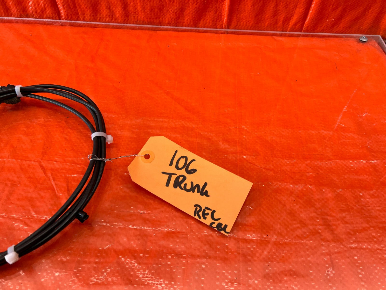 04 08 ACURA TL   TRUNK RELEASE CABLE OPENER LEVER   OEM FACTORY #1063