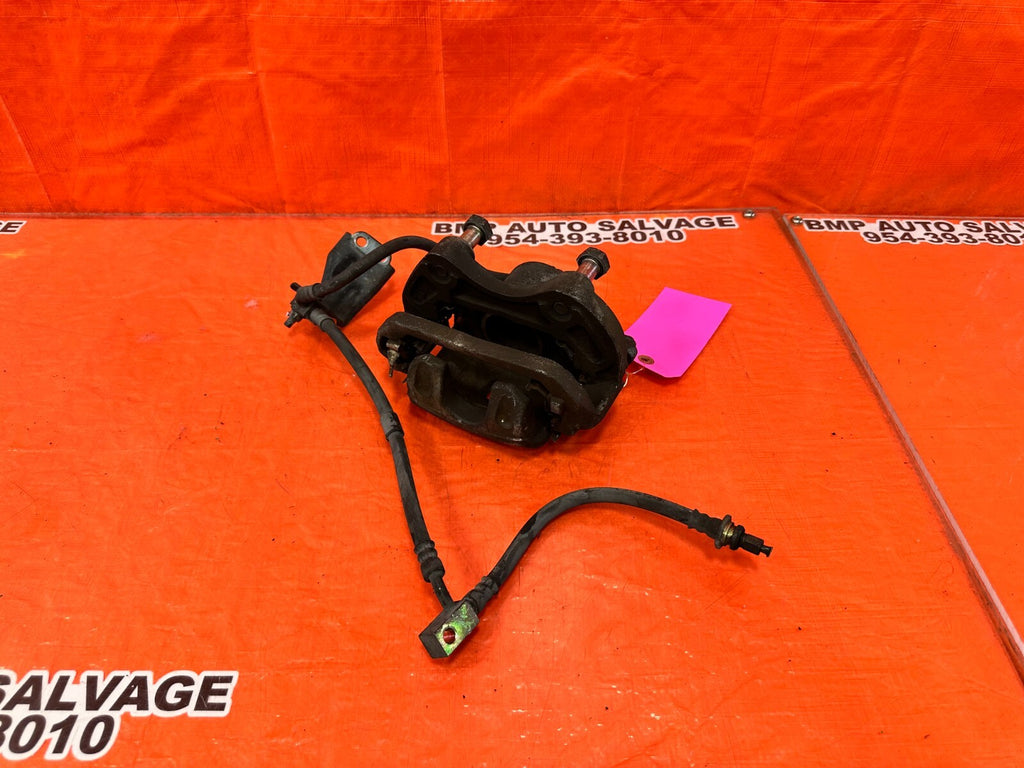 03 05 NISSAN 350Z   DRIVER LEFT FRONT BRAKE CALIPER   OEM FACTORY #26210