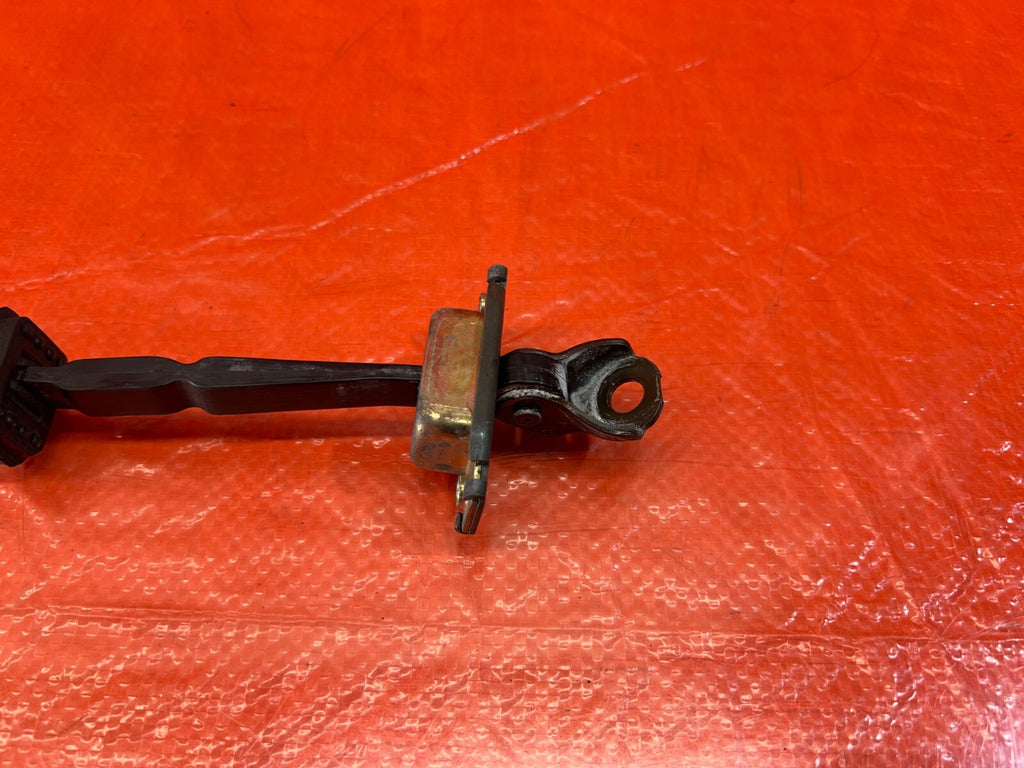 02 06 ACURA RSX   DRIVER LEFT   DOOR CHECKER HINGE ARM STOPPER   OEM #1725