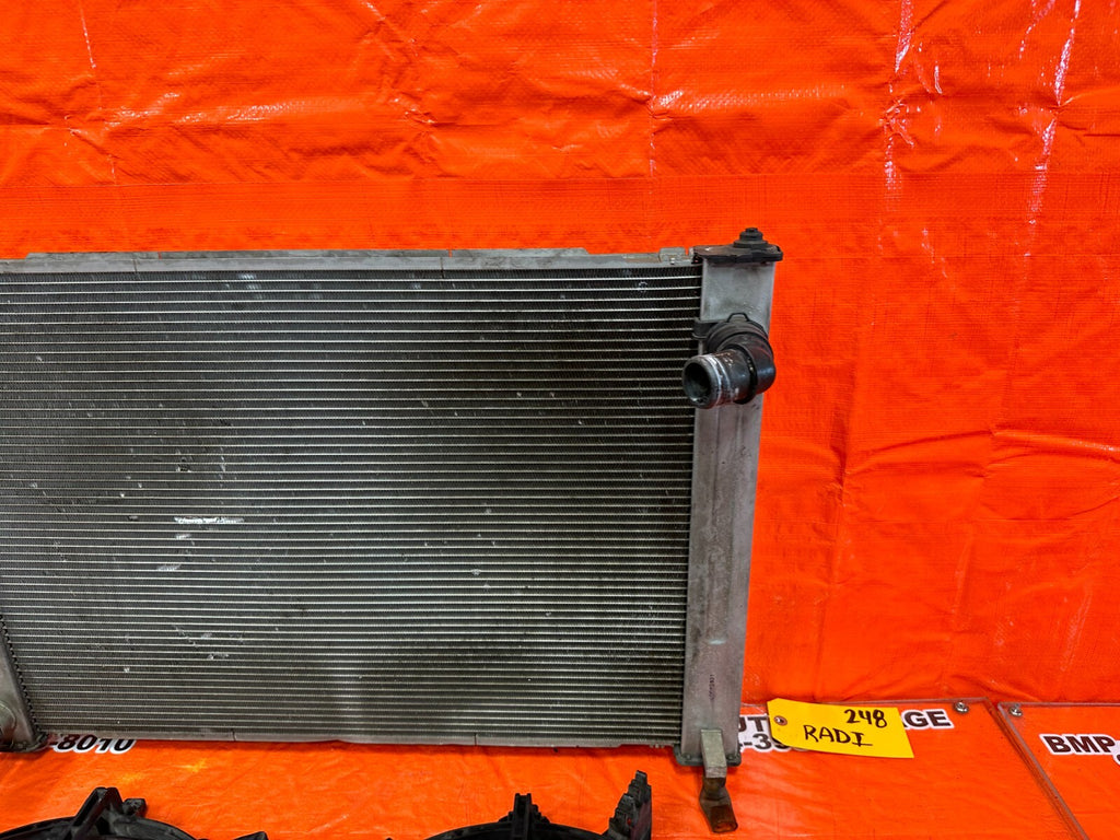 08 15 INFINITI G37 & Q60   6 SPEED MANUAL ONLY   RADIATOR W/ BOTH FANS OEM #2486