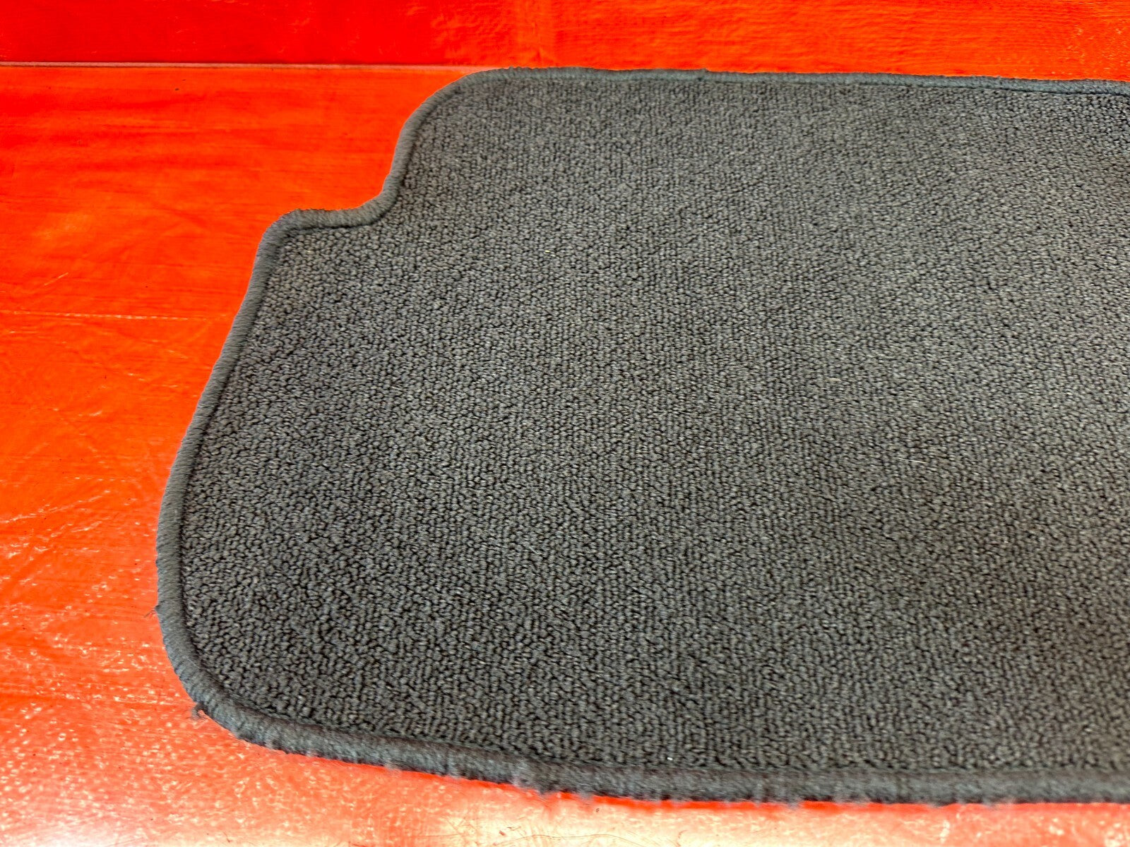 MAZDA FLOOR MAT   LEFT REAR SIDE   PART # BLMS 8M L03A   OEM #1858