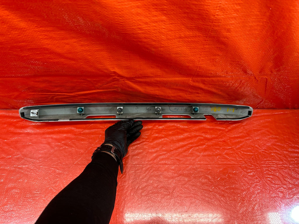 15 21 SUBARU WRX & STI   REAR TRUNK LICENSE PLATE LIGHT TRIM GARNISH   OEM #18010