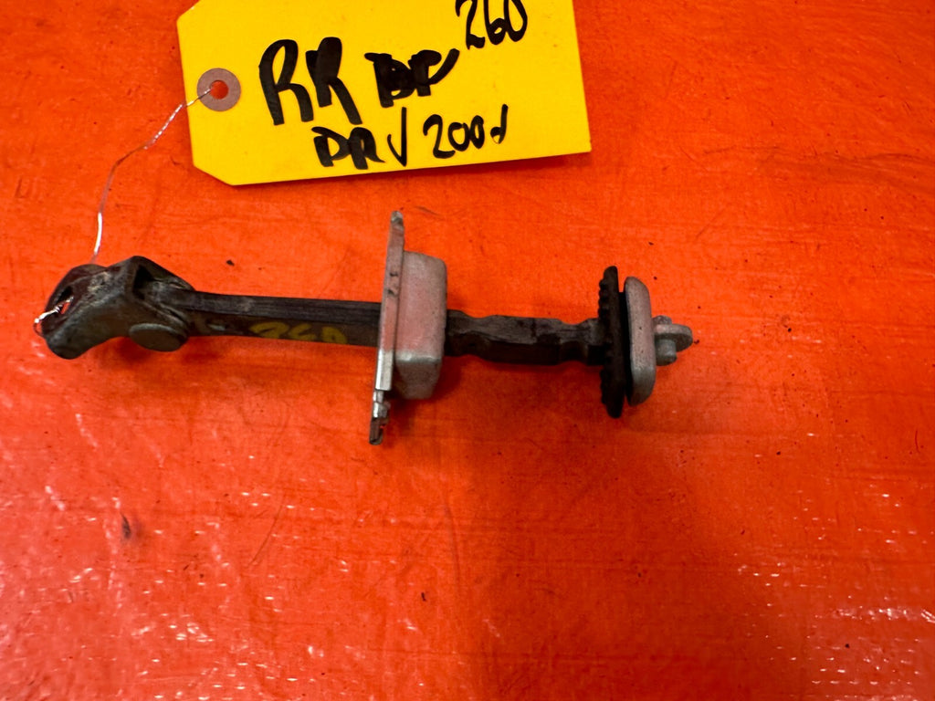06 11 CIVIC 4D SEDAN   PASSENGER RIGHT REAR DOOR CHECKER HINGE ARM STOPPER #2604