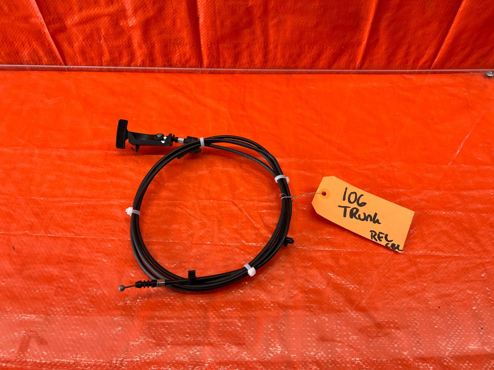04 08 ACURA TL   TRUNK RELEASE CABLE OPENER LEVER   OEM FACTORY #1060