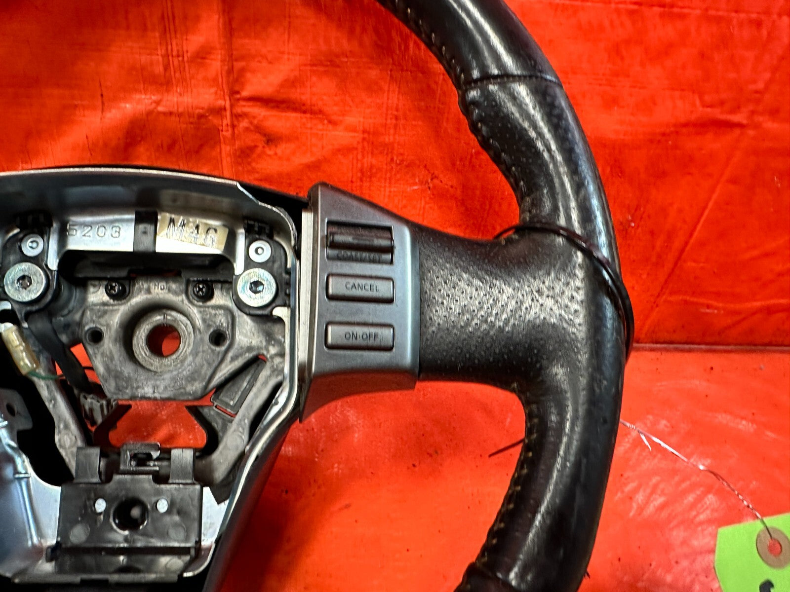 05 07 INFINITI G35 COUPE   STEERING WHEEL   BLACK LEATHER WRAP   OEM #2983